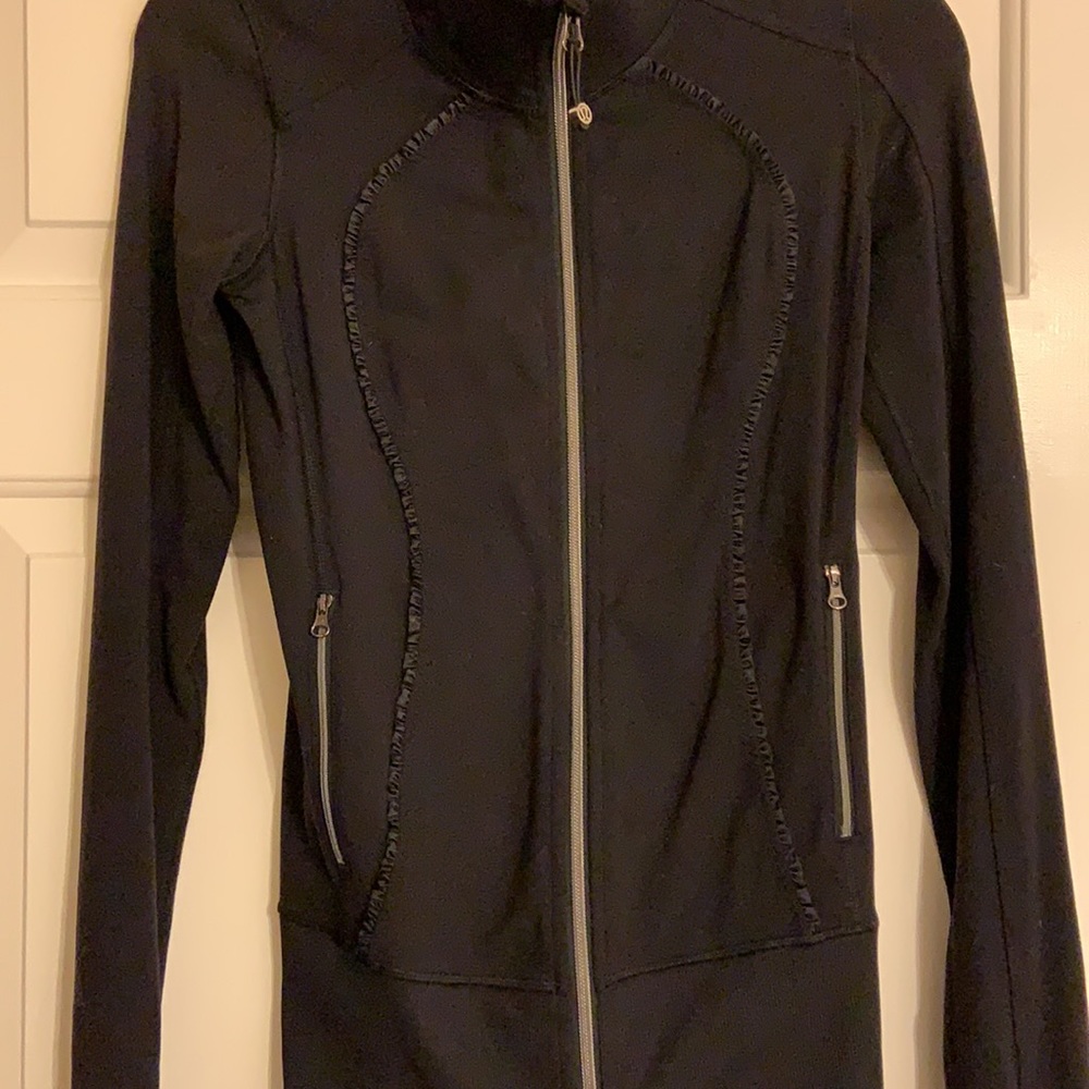 Black Lululemon jacket. Worn twice, washed once.  Excellent condition.